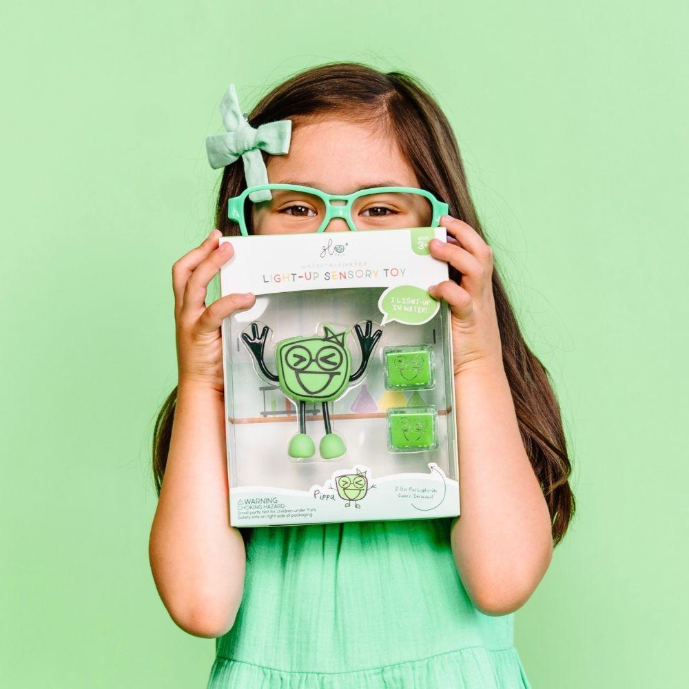 Pack Glo Pals - Personagem Pippa + 2 Cubos de luz Verde Mini-Me - Baby & Kids Store
